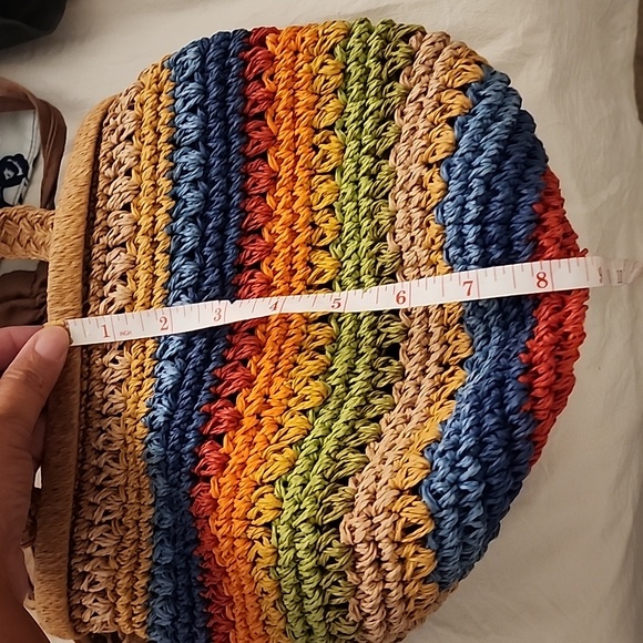 Multi coloured straw bag with drawstring top. inside zip privacy pocket - Picture 5 of 10